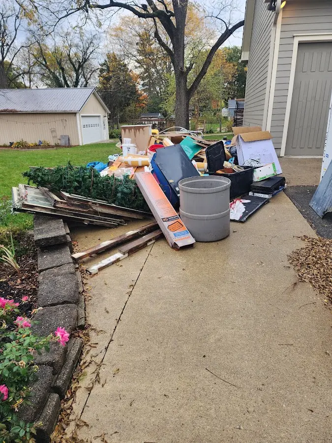 Dumpster being loaded with debris for 30 Yard Dumpster Rental in Canyon Lake